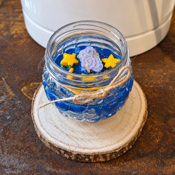 Bougie artisanale Douce Nuit en pot avec lune et étoiles bleues