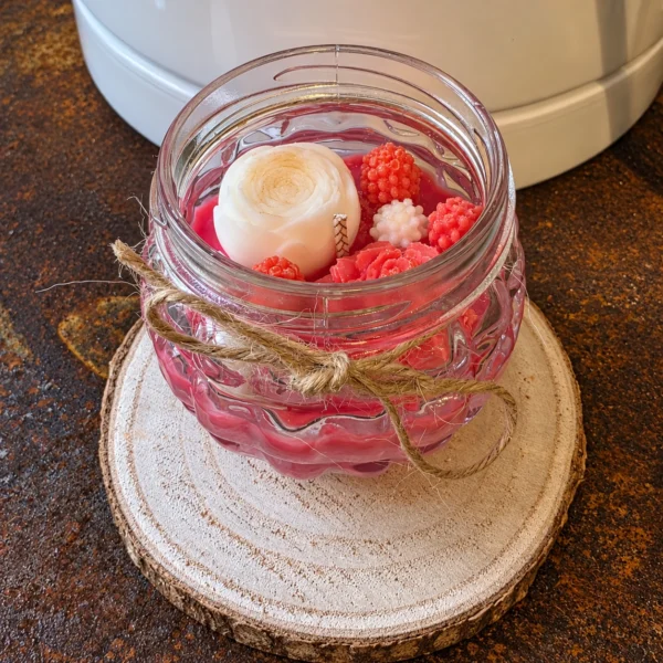 Bougie artisanale Roses Enlacées en pot en verre aux fleurs roses et rouges